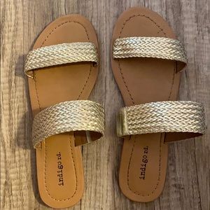 Gold sandals from indigo Rd.